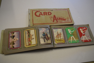 These are albums of swap cards.
