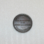 This is a 19th century store token.