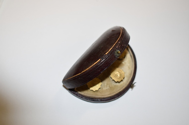 Container - Studs in a container, Early 20th Century
