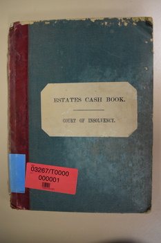 This is a dark blue cash book with maroon binding.
