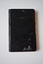 This is a black notebook from the Mepunga Church of England.