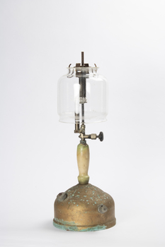This is a vintage Coleman lamp.