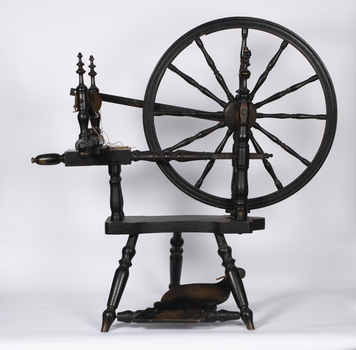 This is a spinning wheel owned by the The Allan family.