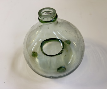 This is a hand blown glass fly trap