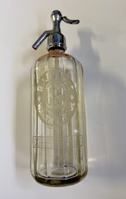 This is a glass soda syphon bottle.