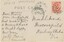 The writing side of a postcard, with message and address written in pen and an accession number in pencil.