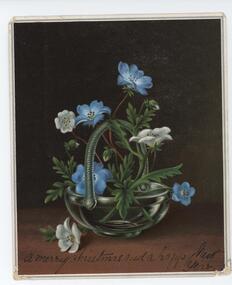 Post card with black and red background, a silver bowl filled with blue and white flowers on long red stems and green leaves