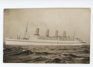 Yellowed monochrome postcard depicting white four-funnelled ocean liner with red-cross flags on ocean waters. 