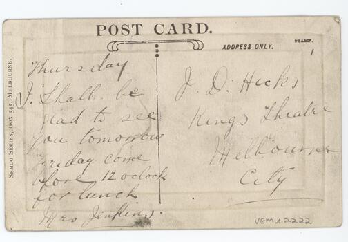 A faded message on the back of a postcard. 