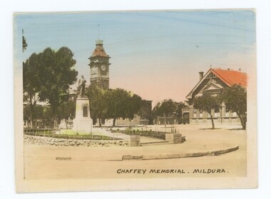 Statue of William Chaffey on tall plinth with Mildura Town Hall in background