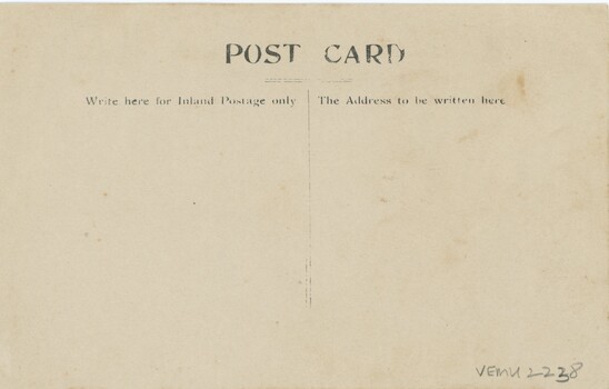 A blank yellowed postcard