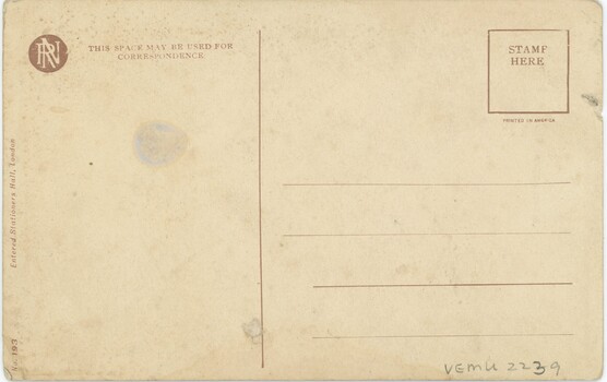 A blank yellowed postcard, with lines for an address and space for a message.