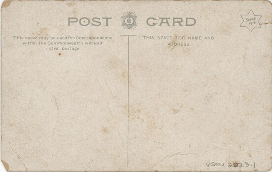 Yellowed card divided into two sections for writing on with a logo at the top and a star in the top right for stamp placement.