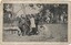 Postcard depicting six policemen detaining a man in a metal suit (Kelly).
