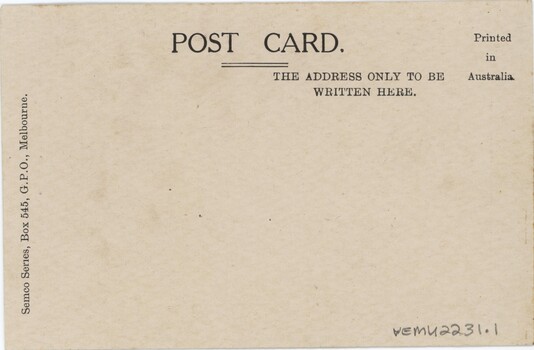 Yellowed postcard with space for writing.