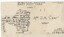 The back of a postcard, with cursive text and that is damaged in some areas.