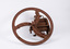 Front view of small chaff cutter with manufacturer inscription visible on wheel