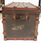 One end of steamer trunk in horizontal position showing carry strap.