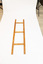 Wooden hanging frame to be attached to steamer trunk for hanging  clothes.