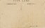 Back of a of post card of children on a street in a Welsh village