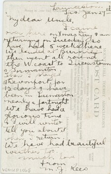 Back of postcard with handwritten message by sender and printed details about the postcard scene.