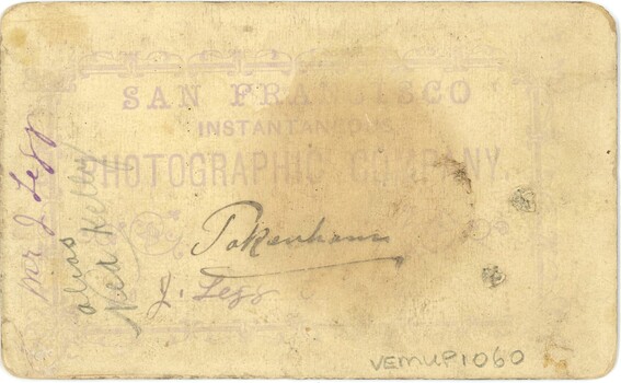 Back of photograph which includes photographer's details