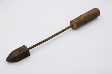 Soldering iron with wooden handle, iron shaft and pointed copper head