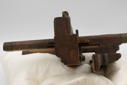 Inscription in plough plane, including several names and a Jenkins & Clark manufacturer imprint