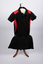 Front of netball uniform with red and black top and black skirt