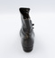 The image shows the back of the right shoe from a pair of black button-up boots.