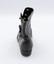 The Image shows the backside of the left shoe from a pair of black button-up boots.