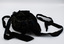 Back of black velvet hat with two black ribbons for tying under chin