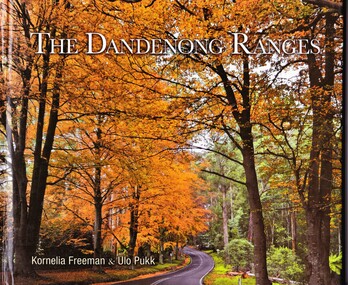 Front cover of book showing title and authors and photo of tree-lined road