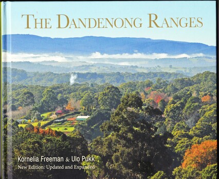 Front cover showing the title and the authors and a photo of trees with distant ranges and a nursery in the foreground.