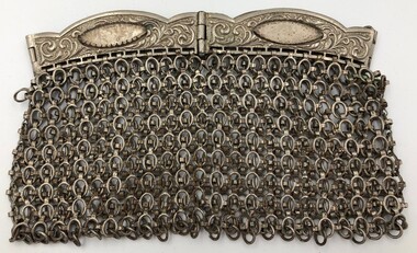 Silver mesh chainmail evening bag. Clutch style handles missing four stones - possibly moonstones.