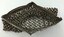 Top view of open silver chainmail evening bag showing clutch-style handle with four jointed parts.