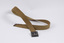 Military belt, khaki, folded to shop the top of the clasp