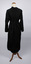 Back of black and white dress with a ribbon tie. 
