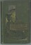 Book cover depicting garden entry with a wooden gate, stone wall and a large urn