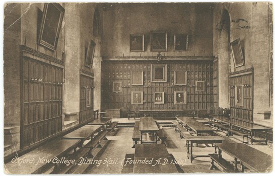 Dining hall with long refectory tables and bench seats, wood paneled walls and paintings hung on walls.