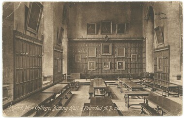 Dining hall with long refectory tables and bench seats, wood paneled walls and paintings hung on walls.