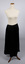 Front view of long black petticoat worn on mannequin