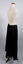 Side view of long black petticoat worn on mannequin