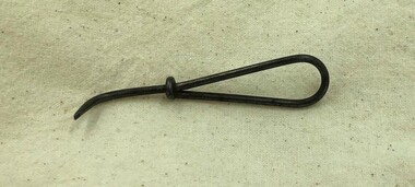 Sewing machine screwdriver lying on side