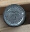 Bottom of needle case with inscriptions visible