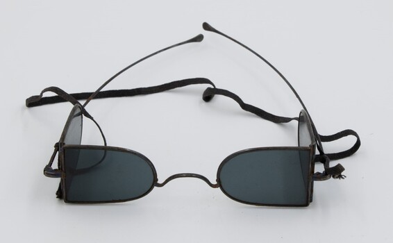 Railway safety glasses with strap.
