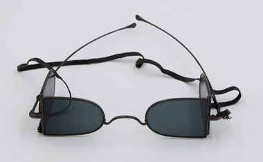 Railway safety glasses with strap.