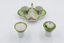 Ceramic cruet set with pepper dispenser and salt cellar separate. 