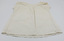 Back of crea-colored baby bodice with round neckline.