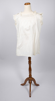 Front view of cream-colored chemise on mannequin